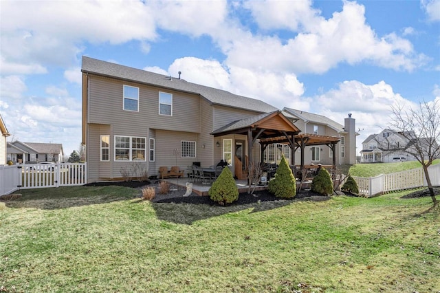 back of house with a patio, a gate, a yard, a gazebo, and fence private yard