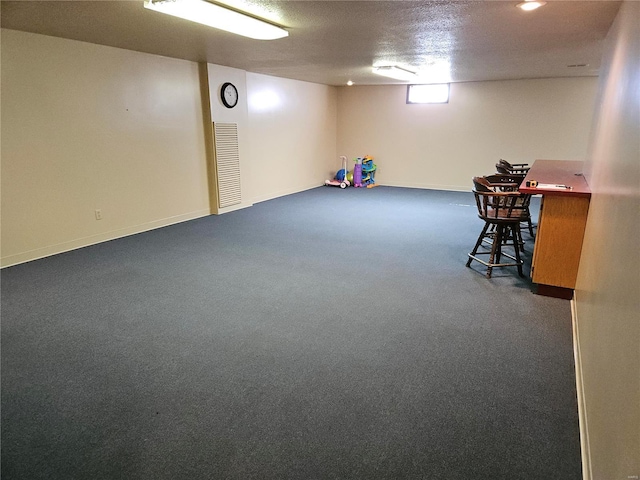 game room with visible vents, baseboards, and carpet