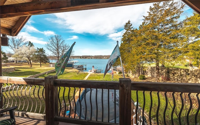 balcony featuring a water view