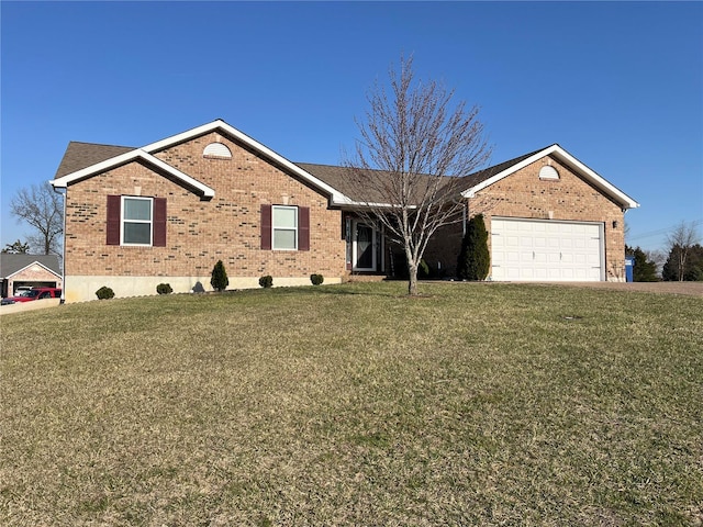 ranch-style house with a front lawn, a garage, and brick siding