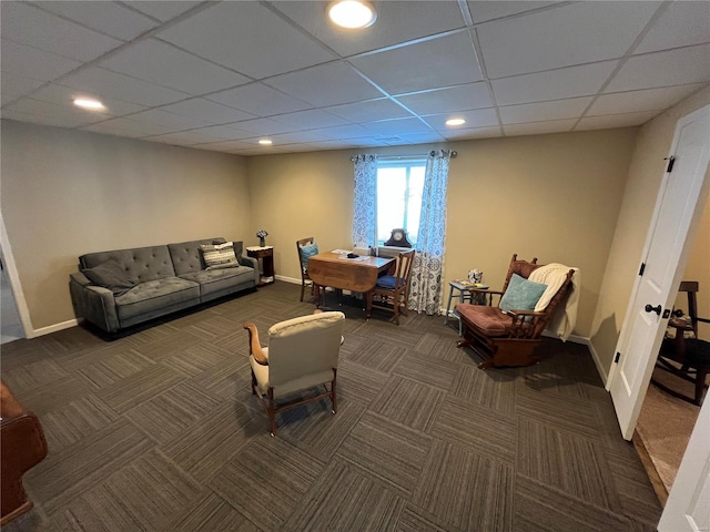 carpeted living area with recessed lighting, a paneled ceiling, and baseboards