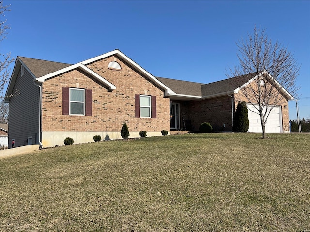 ranch-style home with a front lawn, brick siding, and an attached garage