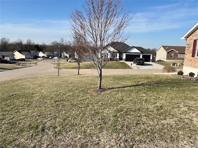 view of yard featuring a residential view