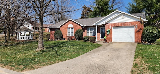 ranch-style house featuring a front lawn, an attached garage, brick siding, and concrete driveway