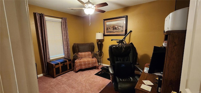 office with a ceiling fan, baseboards, and carpet floors