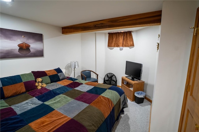 bedroom with carpet floors and baseboards