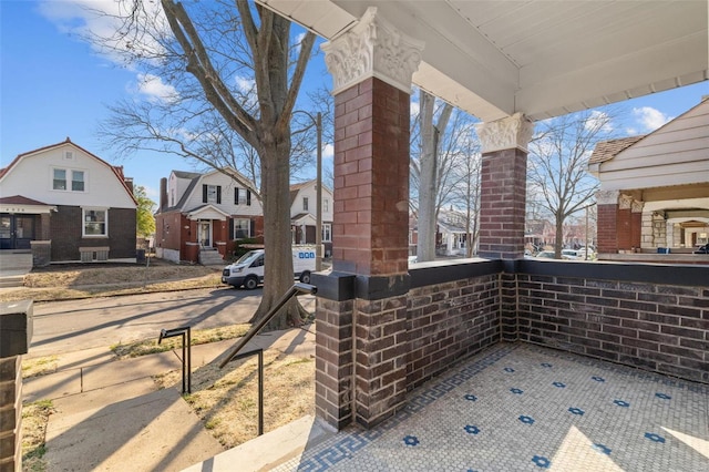 view of patio / terrace with a residential view