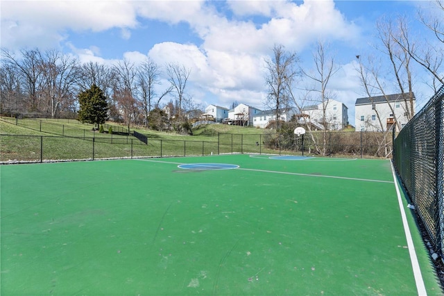 view of sport court featuring community basketball court and fence