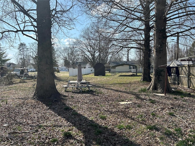 view of yard featuring fence