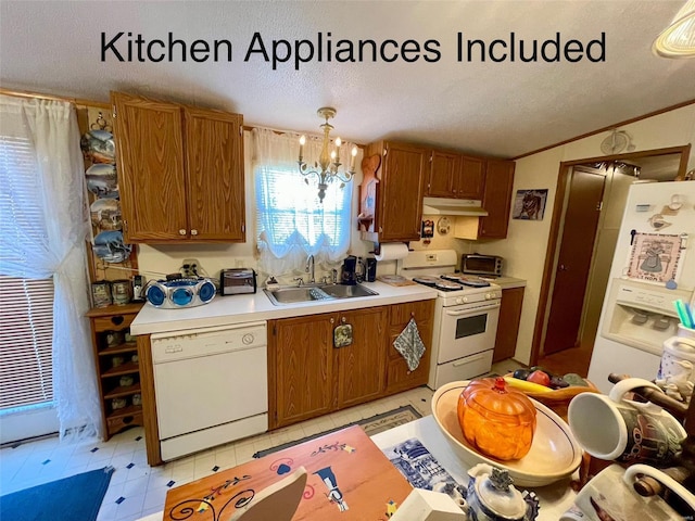 kitchen featuring a sink, white appliances, brown cabinetry, light countertops, and a chandelier