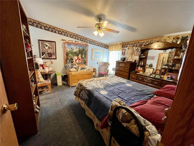 bedroom featuring ceiling fan, ornamental molding, dark carpet, and a textured ceiling