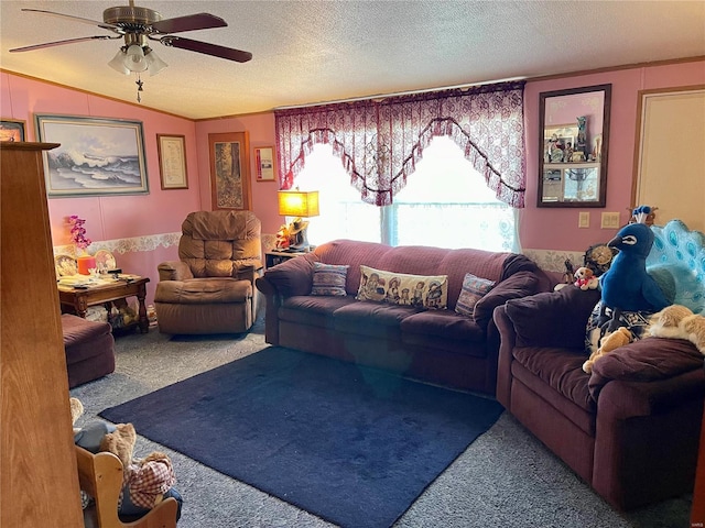 carpeted living room featuring a textured ceiling, lofted ceiling, and a ceiling fan