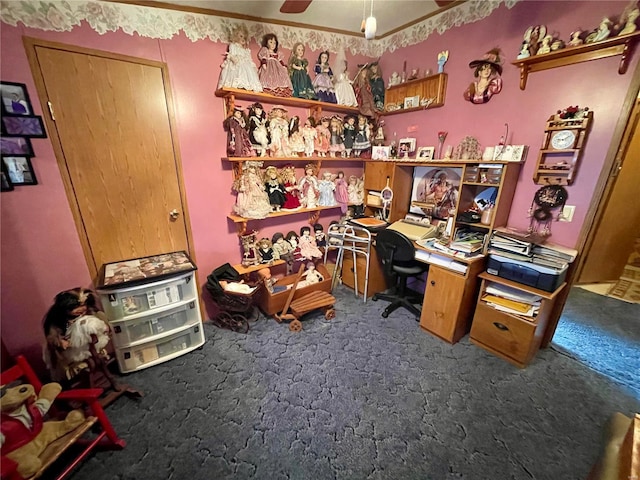 home office featuring a ceiling fan and carpet floors