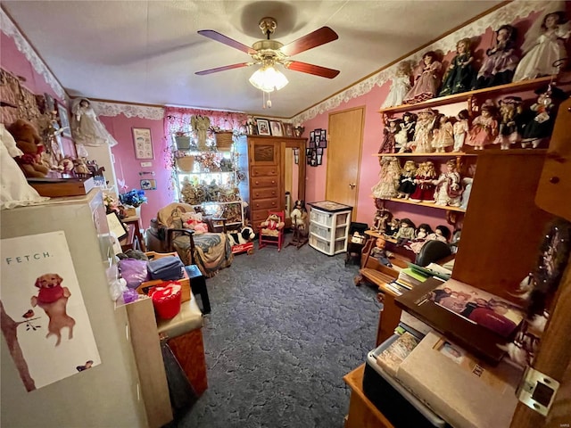 interior space with ornamental molding, carpet, and ceiling fan