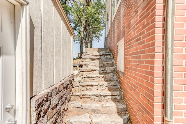 view of home's exterior featuring brick siding