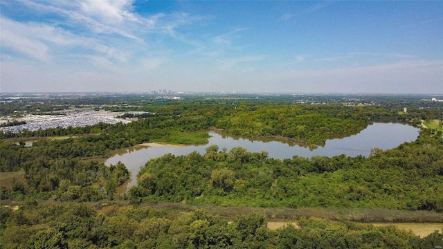 aerial view with a forest view and a water view