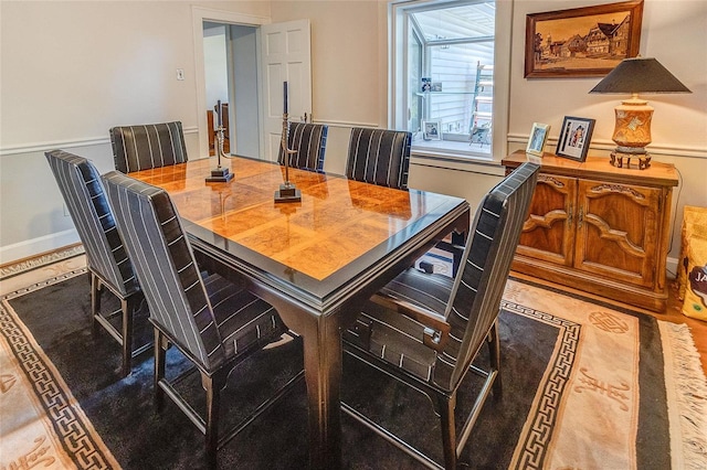 dining space with baseboards