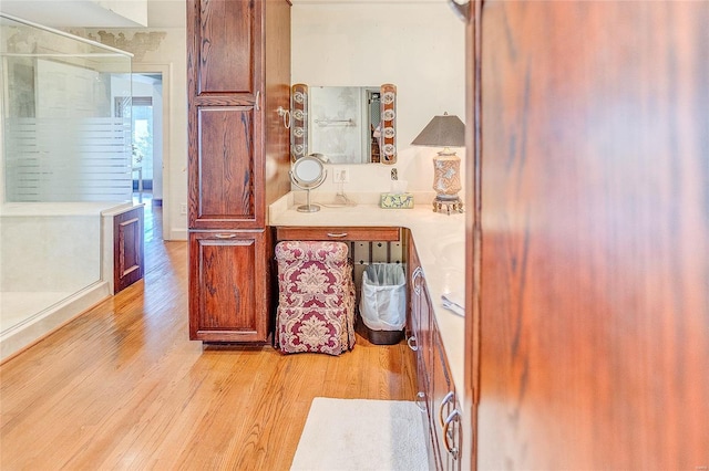 bathroom with wood finished floors