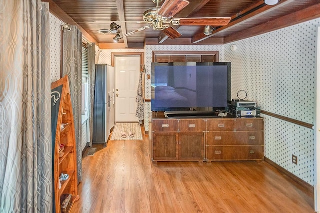 living room with wood ceiling, wallpapered walls, light wood-type flooring, and ceiling fan