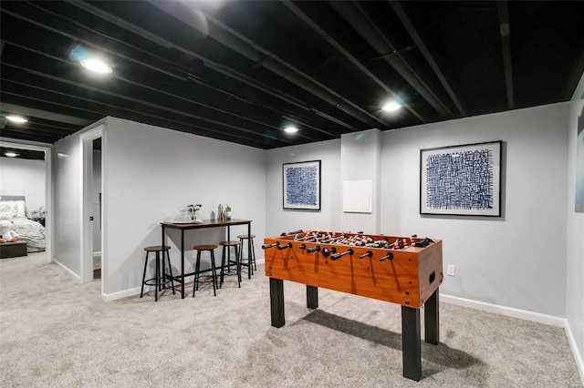 playroom with baseboards and carpet floors