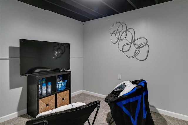 playroom featuring carpet flooring and baseboards