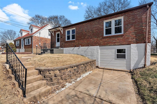 view of front of home with brick siding