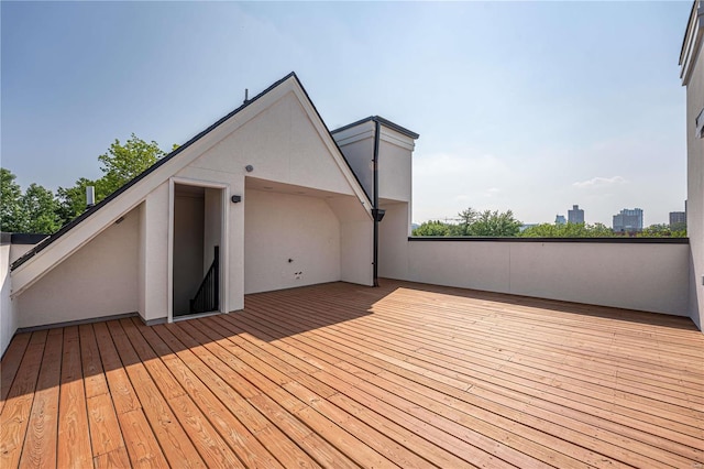 wooden terrace with a view of city