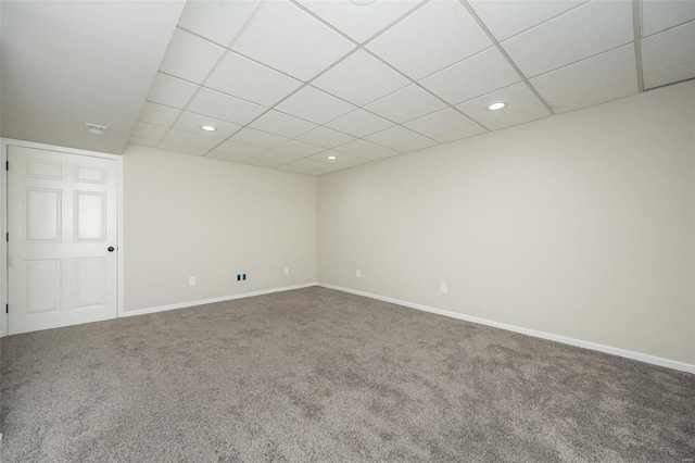 carpeted empty room with recessed lighting, a paneled ceiling, and baseboards