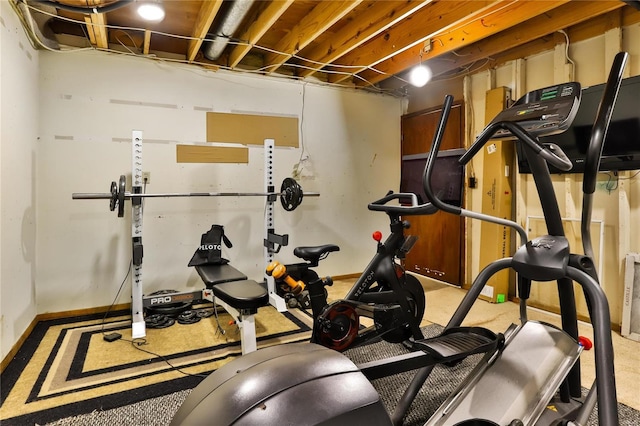 workout room with baseboards