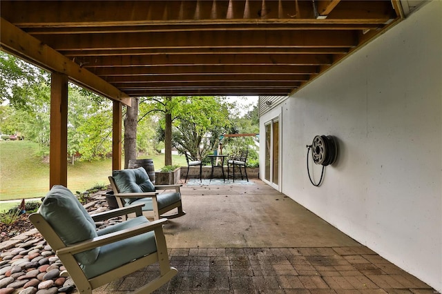 view of patio featuring outdoor dining area