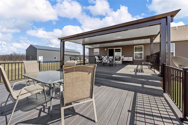 deck with outdoor dining space