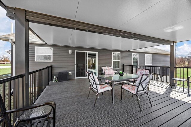 deck featuring outdoor dining space