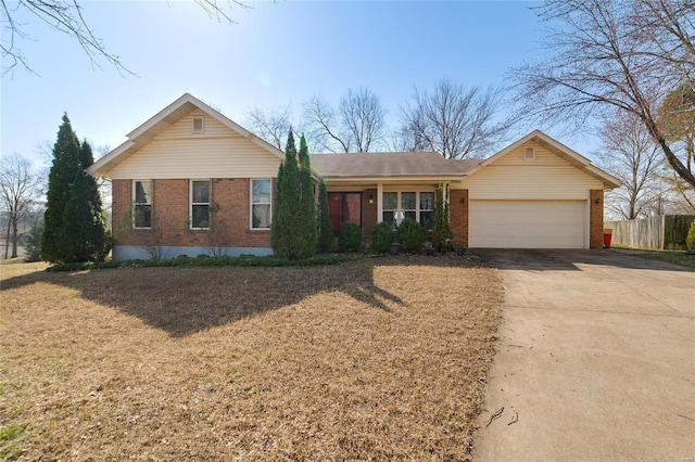 ranch-style home with brick siding, driveway, a garage, and fence