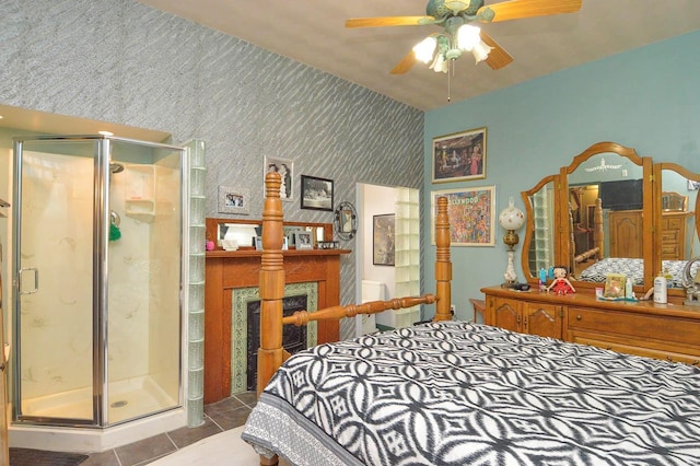 tiled bedroom with a fireplace and wallpapered walls