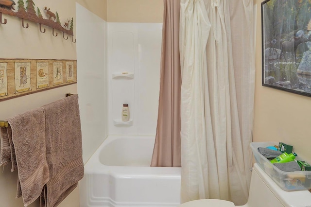 bathroom featuring toilet and shower / bathtub combination with curtain