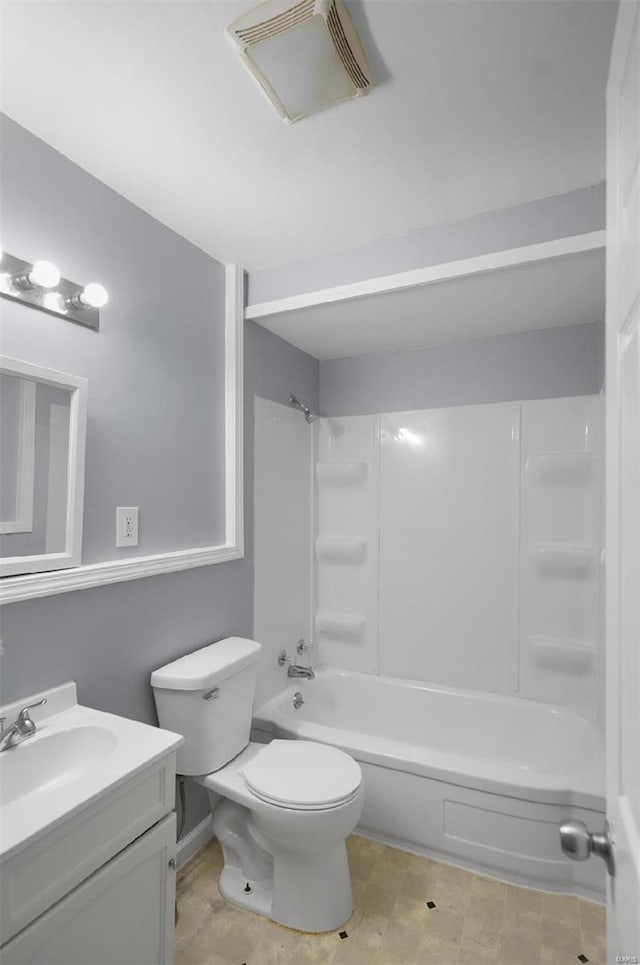 bathroom featuring visible vents, toilet, vanity, and washtub / shower combination