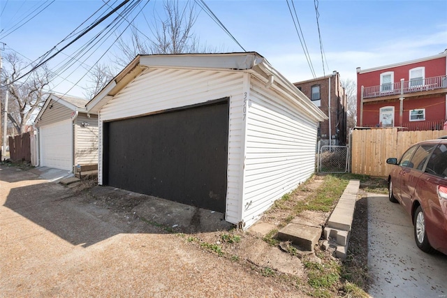 detached garage with fence