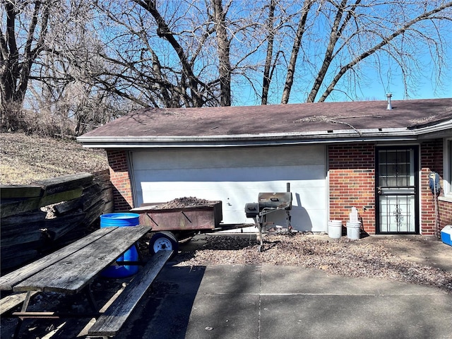 garage featuring driveway