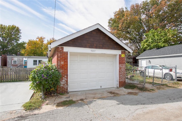 detached garage with fence