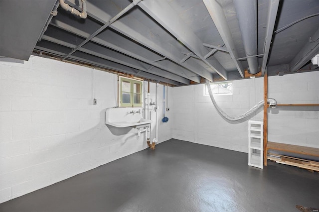 basement featuring a sink