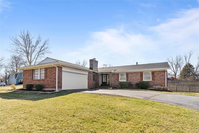 ranch-style house featuring driveway, fence, a garage, brick siding, and a chimney