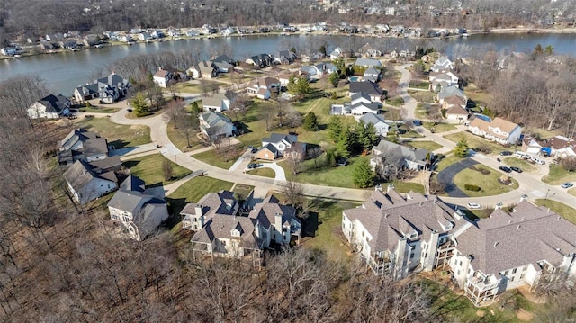 aerial view with a residential view and a water view