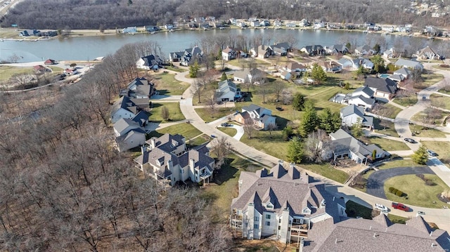 aerial view with a residential view and a water view