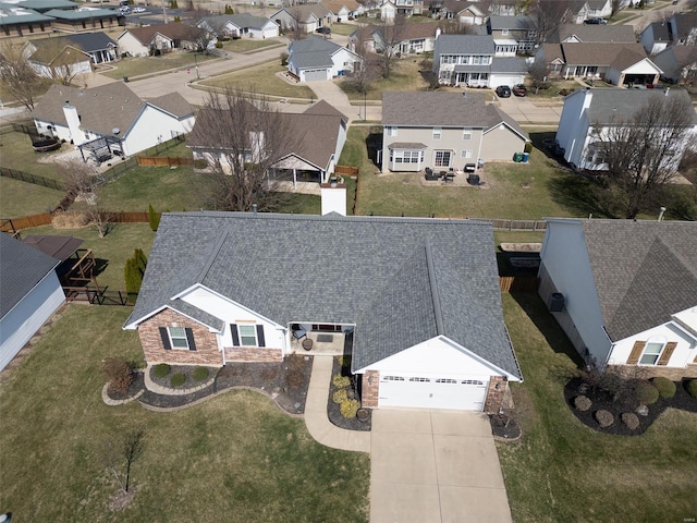 drone / aerial view with a residential view