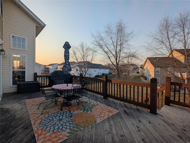 wooden deck featuring outdoor dining space