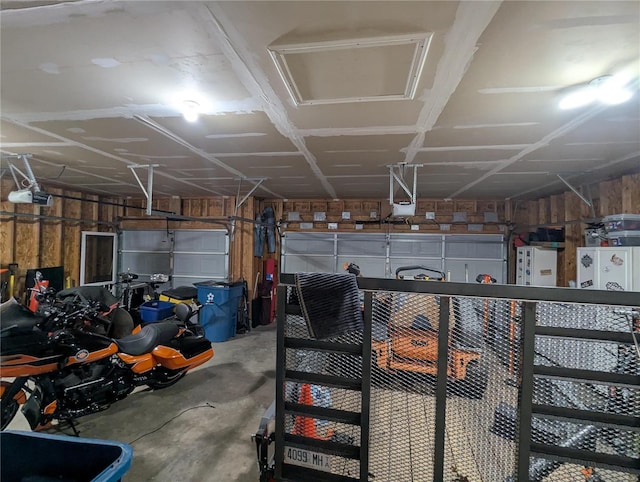 garage featuring a garage door opener