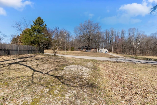 view of yard featuring fence