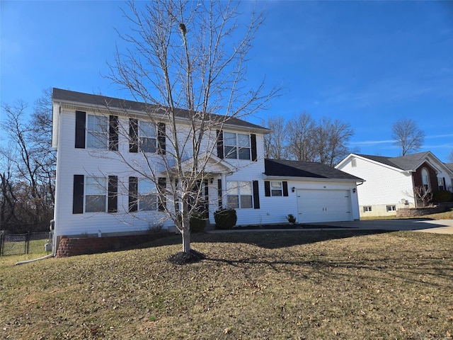 colonial home featuring driveway, a front lawn, a garage, and fence