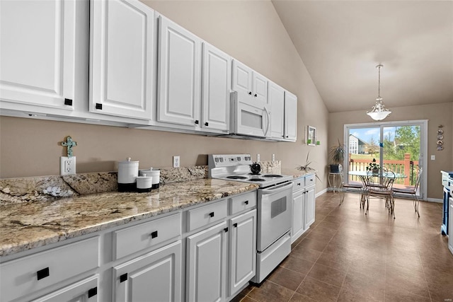 kitchen featuring baseboards, white appliances, lofted ceiling, and white cabinetry