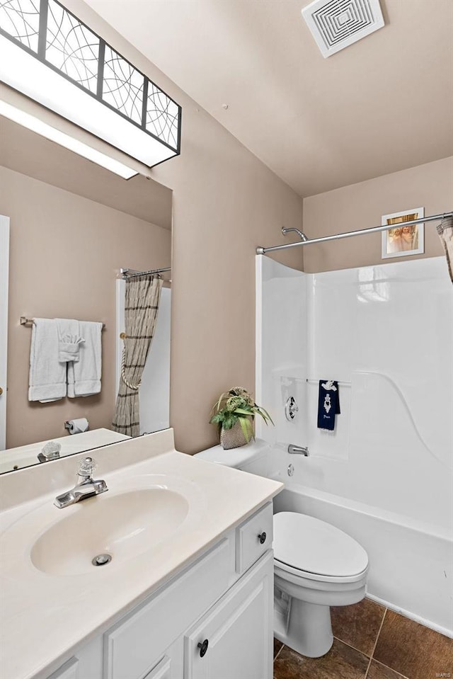 full bathroom with tile patterned floors, visible vents, toilet, shower / tub combo, and vanity